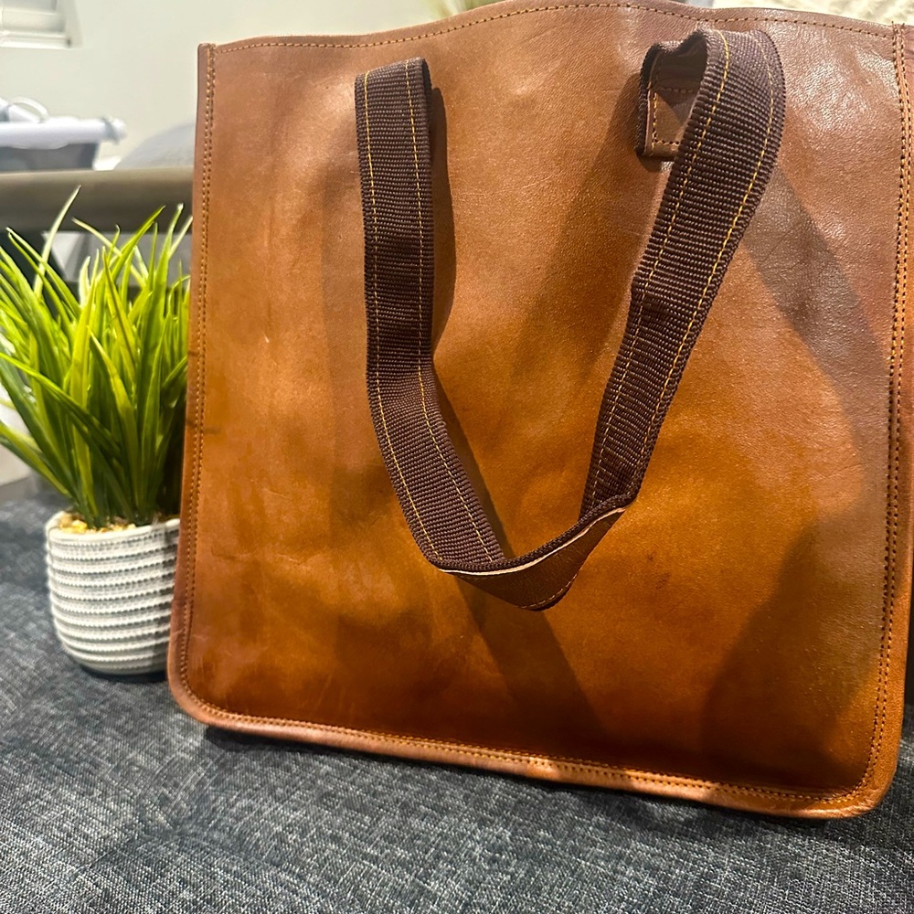 Faux camel color leather bag. See size in photos.